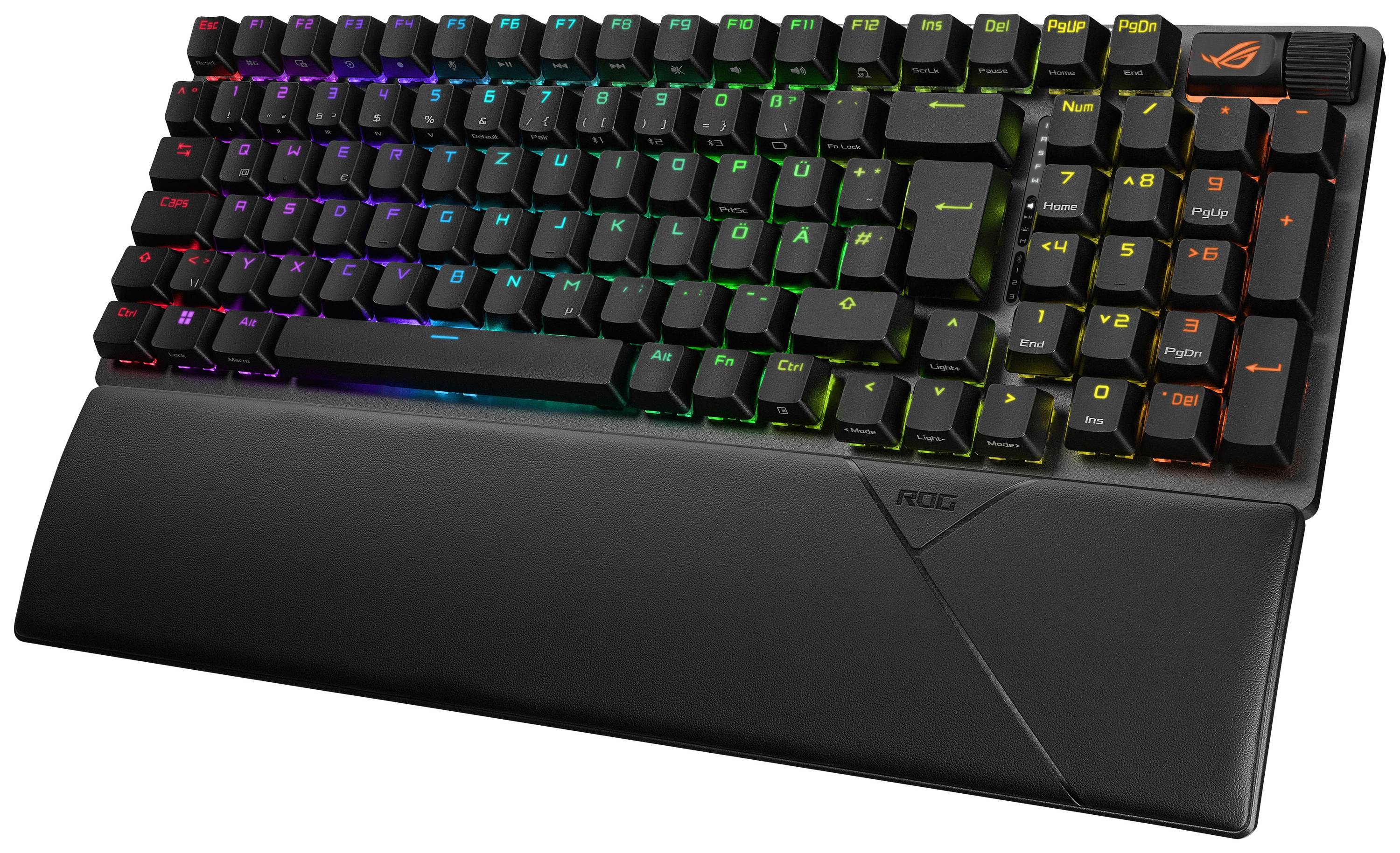 Mechanikus gamer billentyűzet RGB háttérvilágítással és ergonomikus csuklótámasszal, speciális funkciógombokkal.
