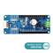 Egy kék Arduino-bővítőpanel különböző csatlakozókkal és komponensekkel. Lent jobbra a logó: 'WORKS WITH ARDUINO'.