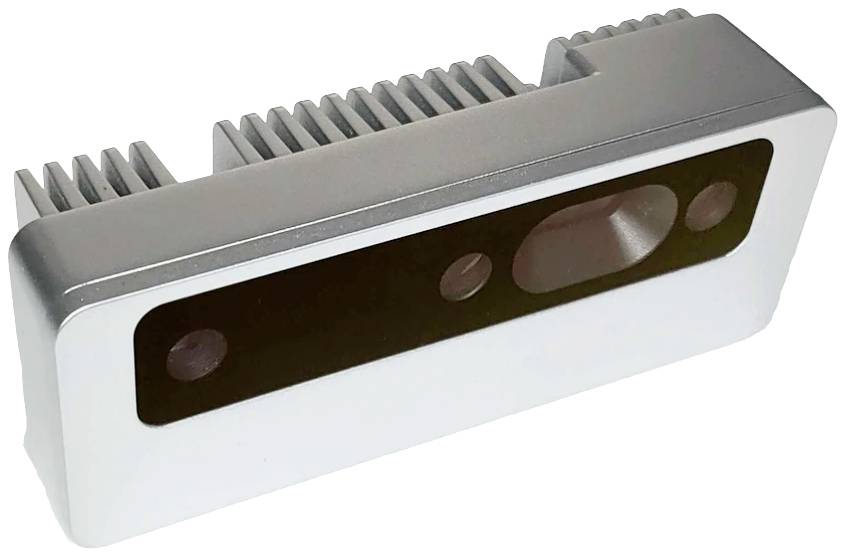 Egy téglalap alakú fémdoboz szellőzőnyílásokkal és három kerek nyílással egy fekete felületen, valószínűleg érzékelők számára.