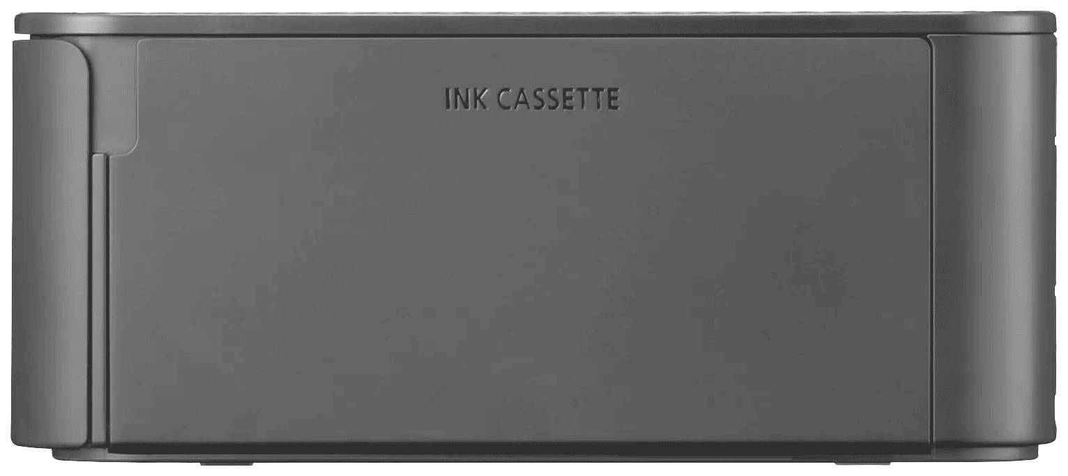 Szürke nyomtatókazetta-rekesz az "INK CASSETTE" felirattal.