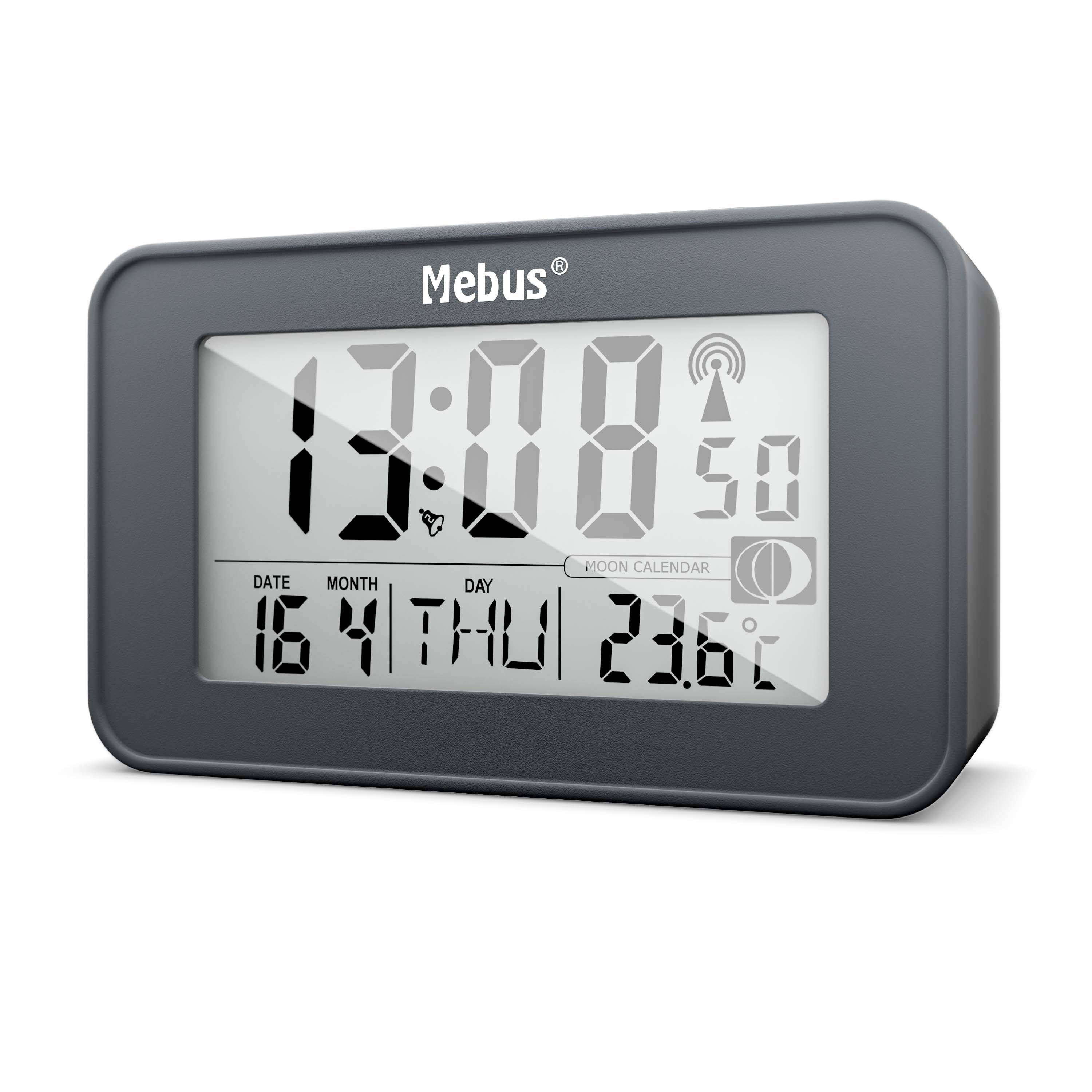 Digitális óra mutatja 13:08-at. Kijelzőn ébresztő és rádiójel szimbólumok. Alatta dátum 16/4, csütörtök, hőmérséklet 23,6°C. Ház szürke.