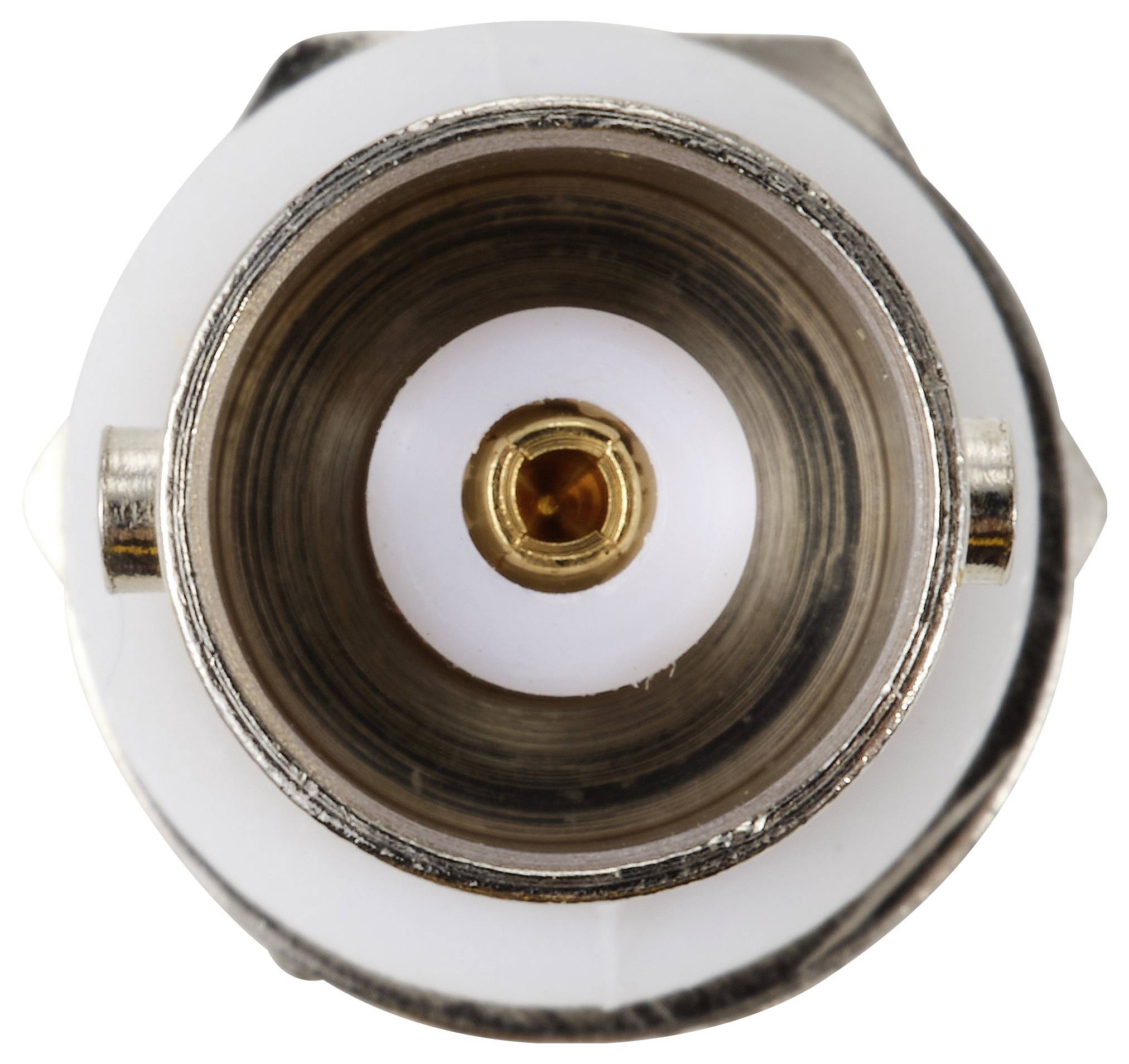 Közelkép egy koaxiális csatlakozóról felülnézetben, amely a központi réz érintkezőt és a körülötte lévő szigetelést mutatja egy fémházban.