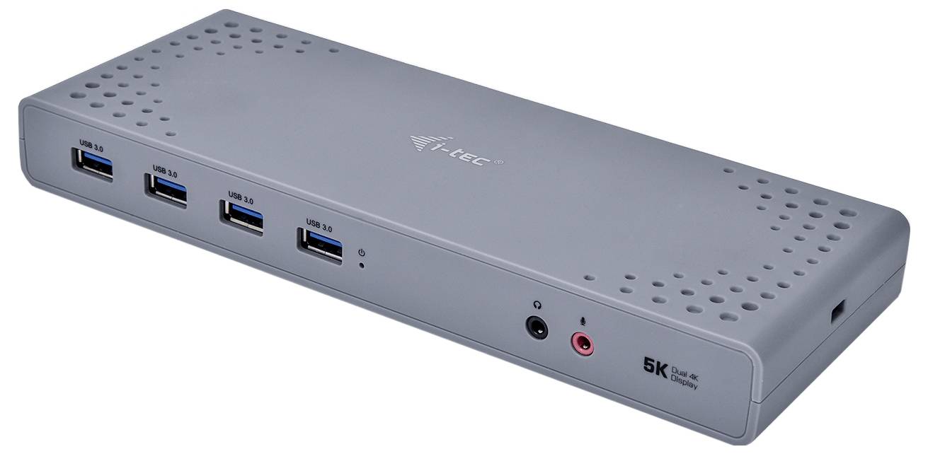 Egy szürke i-tec 5K USB-C dokkoló állomás, amely több USB-csatlakozóval és audió csatlakozókkal rendelkezik az elülső oldalán.
