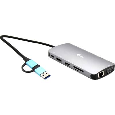 Egy ezüstszínű USB-C hub több csatlakozóval, köztük HDMI, USB 3.0, Ethernet és SD-kártya olvasó. Fehér háttéren fekszik.
