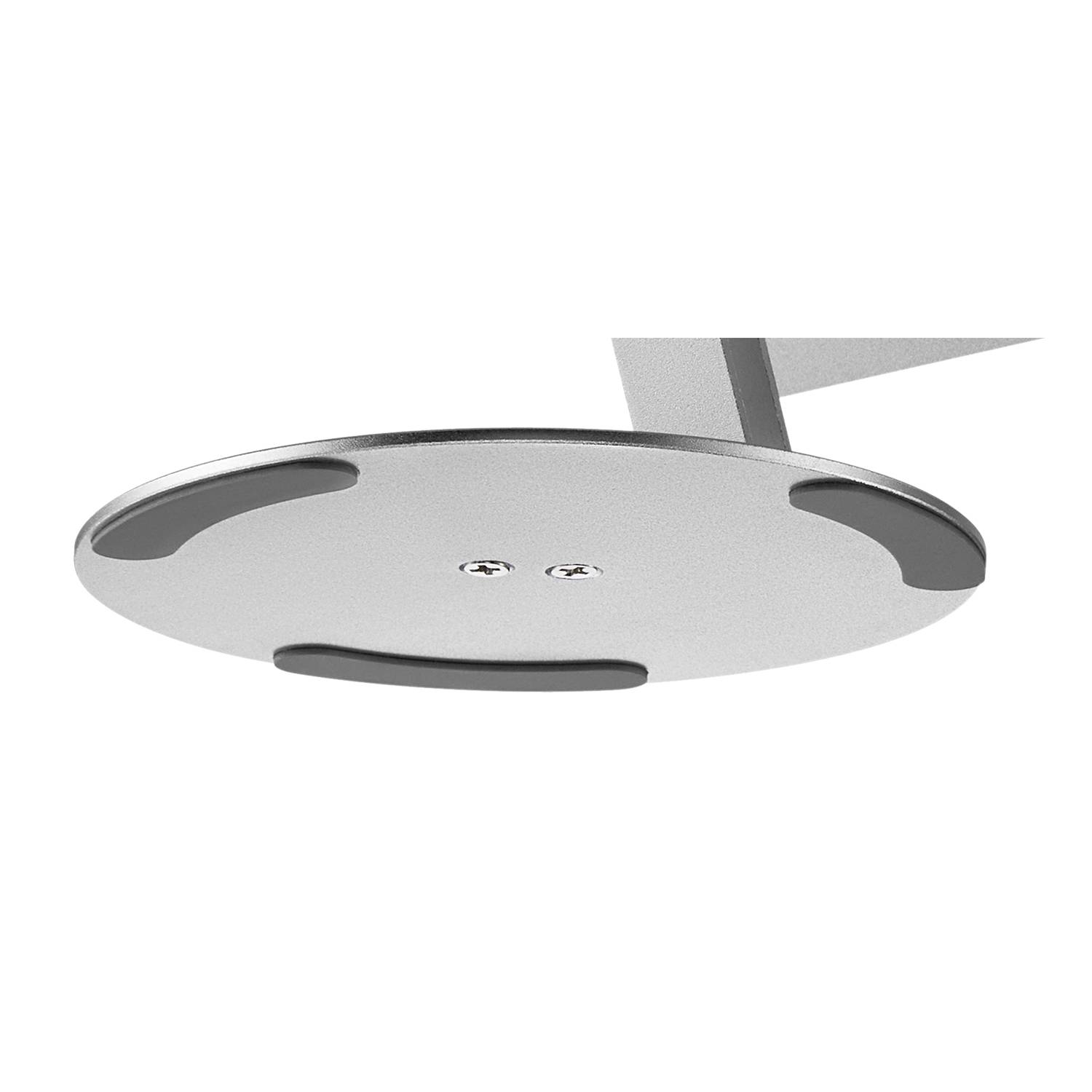 Kerek fémlemez két csavarral és három fekete csúszásgátló gumis felülettel, valószínűleg egy alap vagy tartó része.