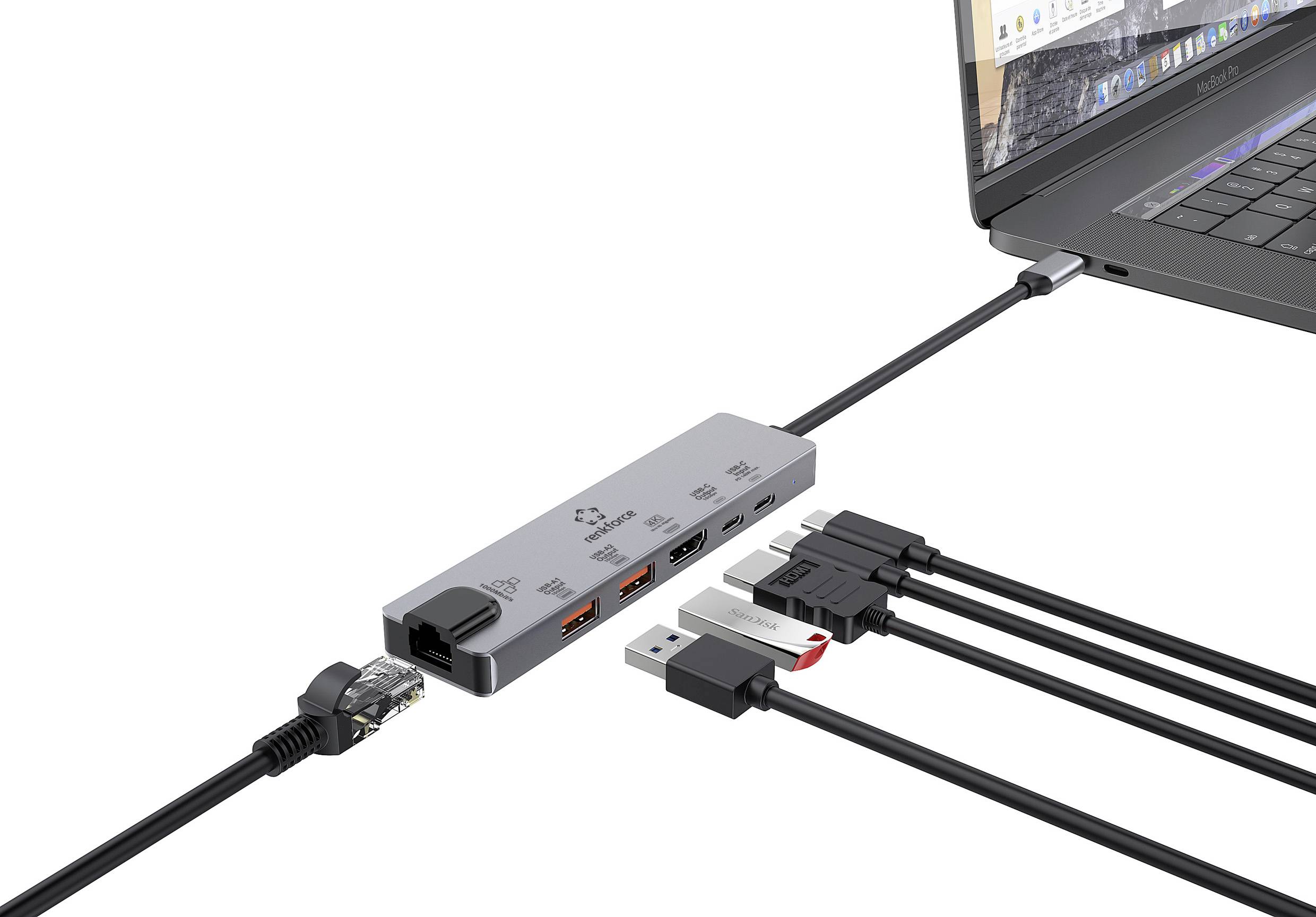 Egy USB-C dokkoló csatlakoztatja a laptopot több eszközhöz: Ethernet, HDMI, USB és SD-kártya olvasó.