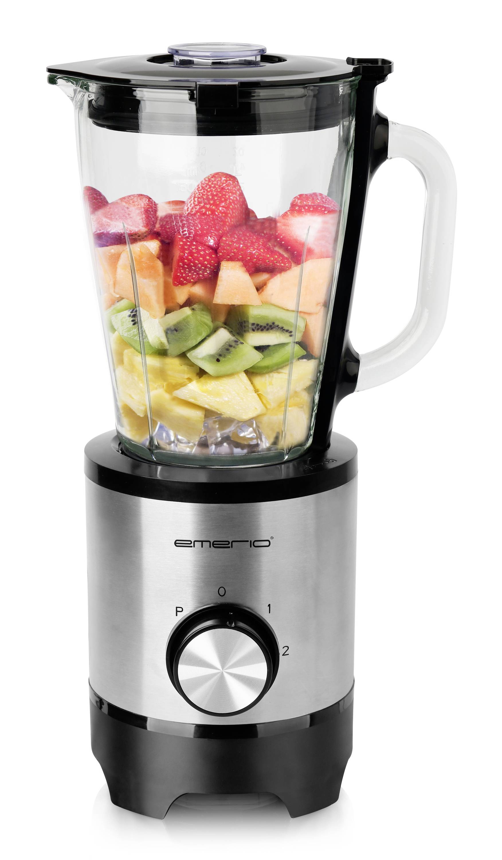 Turmixgép üveg tartállyal, amelyben felszeletelt gyümölcsök vannak, mint eper, dinnye, ananász és kivi. Fekete alapzattal és forgató gombbal.