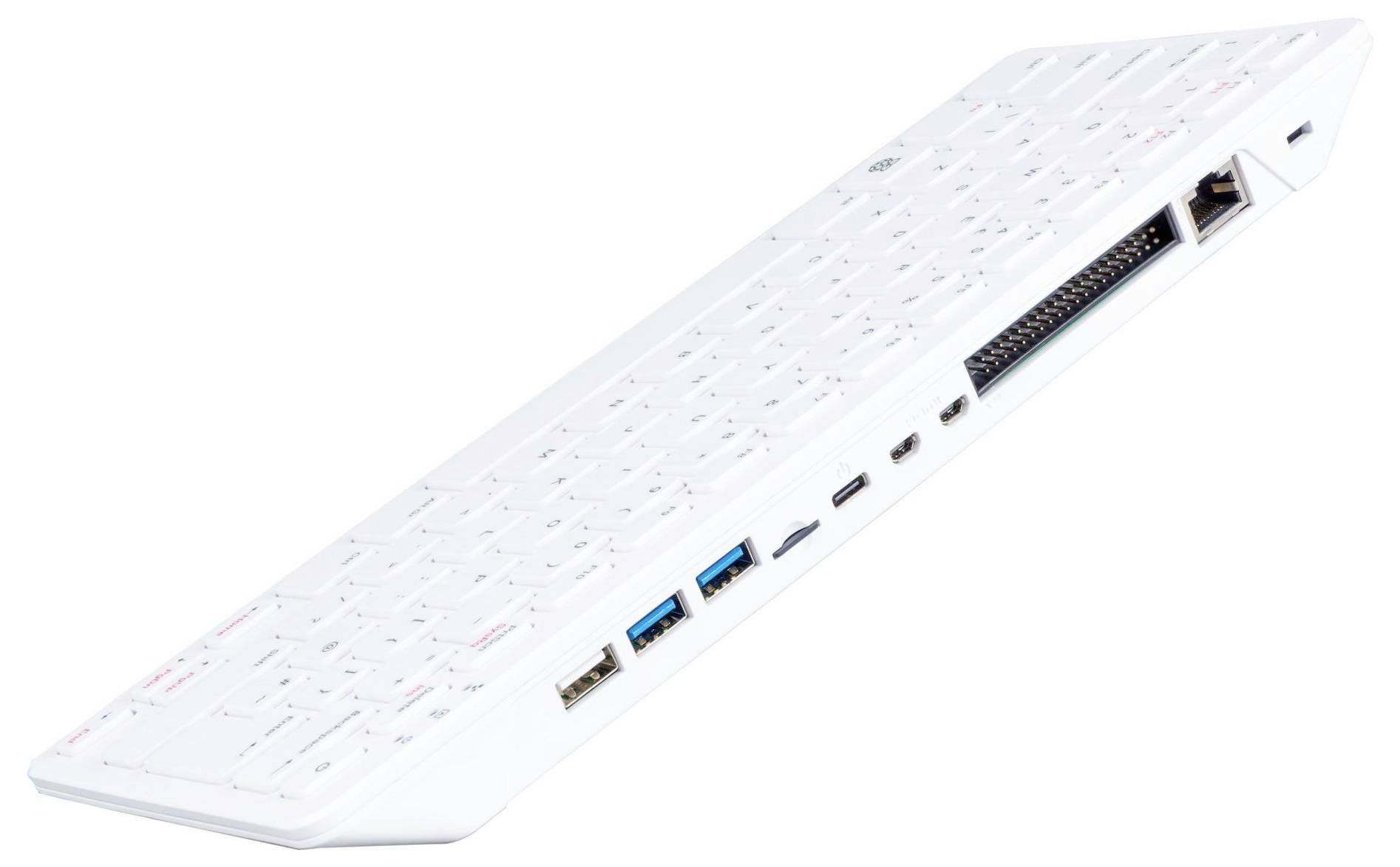 Fehér számítógép-billentyűzet, amely oldalán integrált csatlakozókkal rendelkezik, köztük USB, HDMI és Ethernet, oldalnézetből.