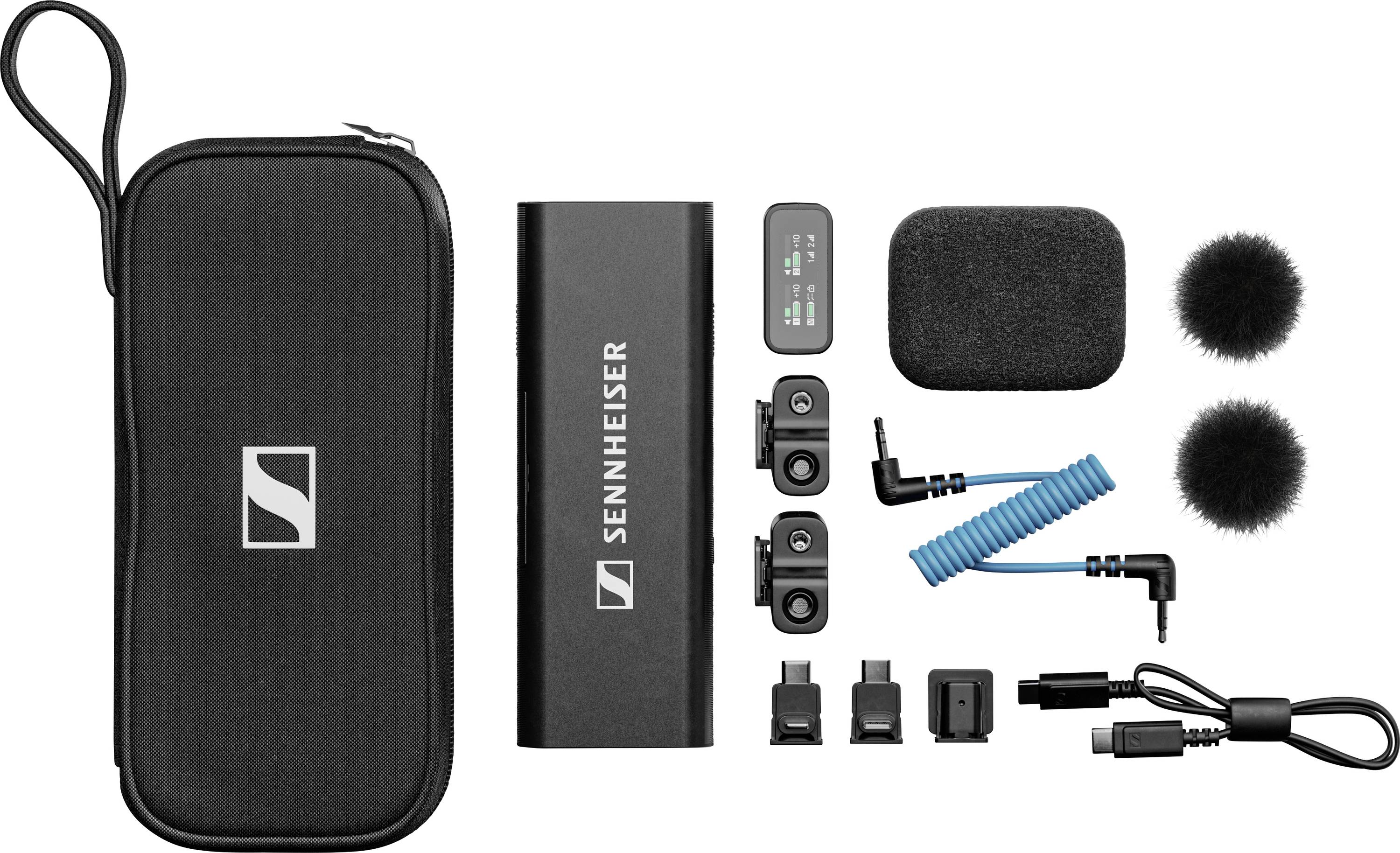 Vezeték nélküli Sennheiser mikrofon szett hordtáskával, vevőegységgel, adókkal, kábelekkel és mikrofonvédőkkel audió felvételekhez.