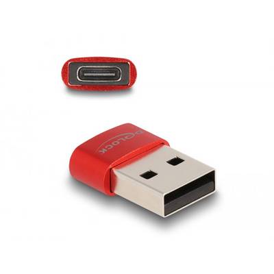 Egy piros USB-adapter USB-C csatlakozóval és szabványos USB-dugaszolóval. Az adapter felületén a 'Delock' felirat látható.
