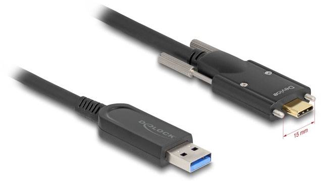 USB-dugasz balra és D-Sub/HDMI-adapter jobbra, egy kábellel összekötve. Az adapter 15 mm szélességet mutat.