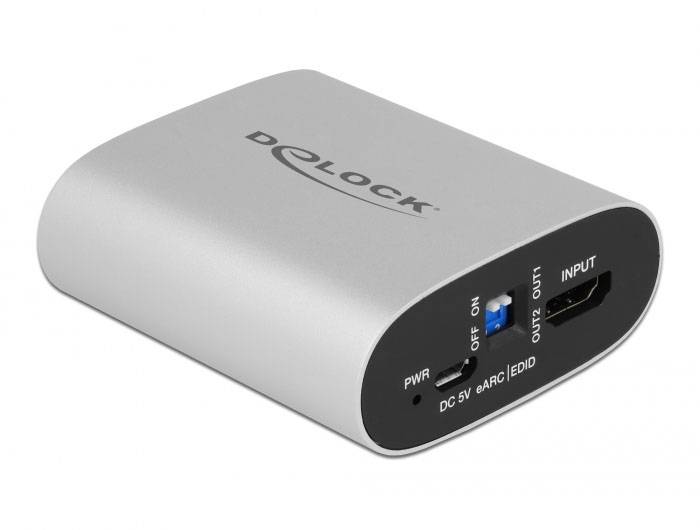 Ezüstszínű adapter 'Delock' logóval, HDMI-bemenettel, két HDMI-kimenettel és kapcsolóval szabványos és EDID üzemmódhoz.