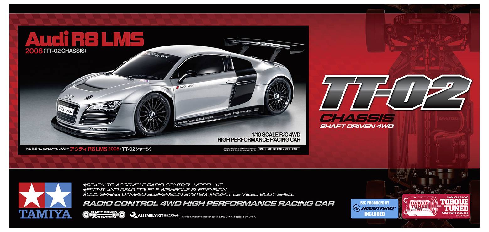 'TT-02 Alváz' távirányítós modell csomagolása 'Audi R8 LMS'-ről, ezüst színben fekete részletekkel, Tamiya gyártótól. 1:10 méretarány.