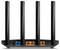 Egy négyantenás Wi-Fi-router. Hátulnézete a csatlakozókat mutatja: tápellátás, WAN (kék), LAN1 és LAN2 (narancssárga).
