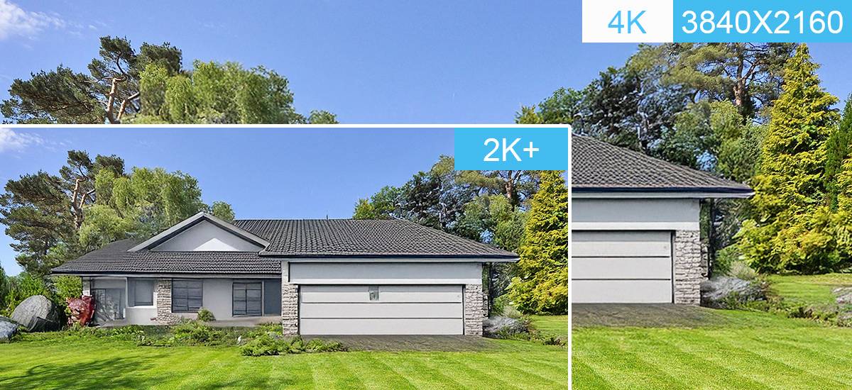 Egy modern családi ház szürke tetővel, két garázskapuval, zöld kert veszi körül, erdős háttér előtt.