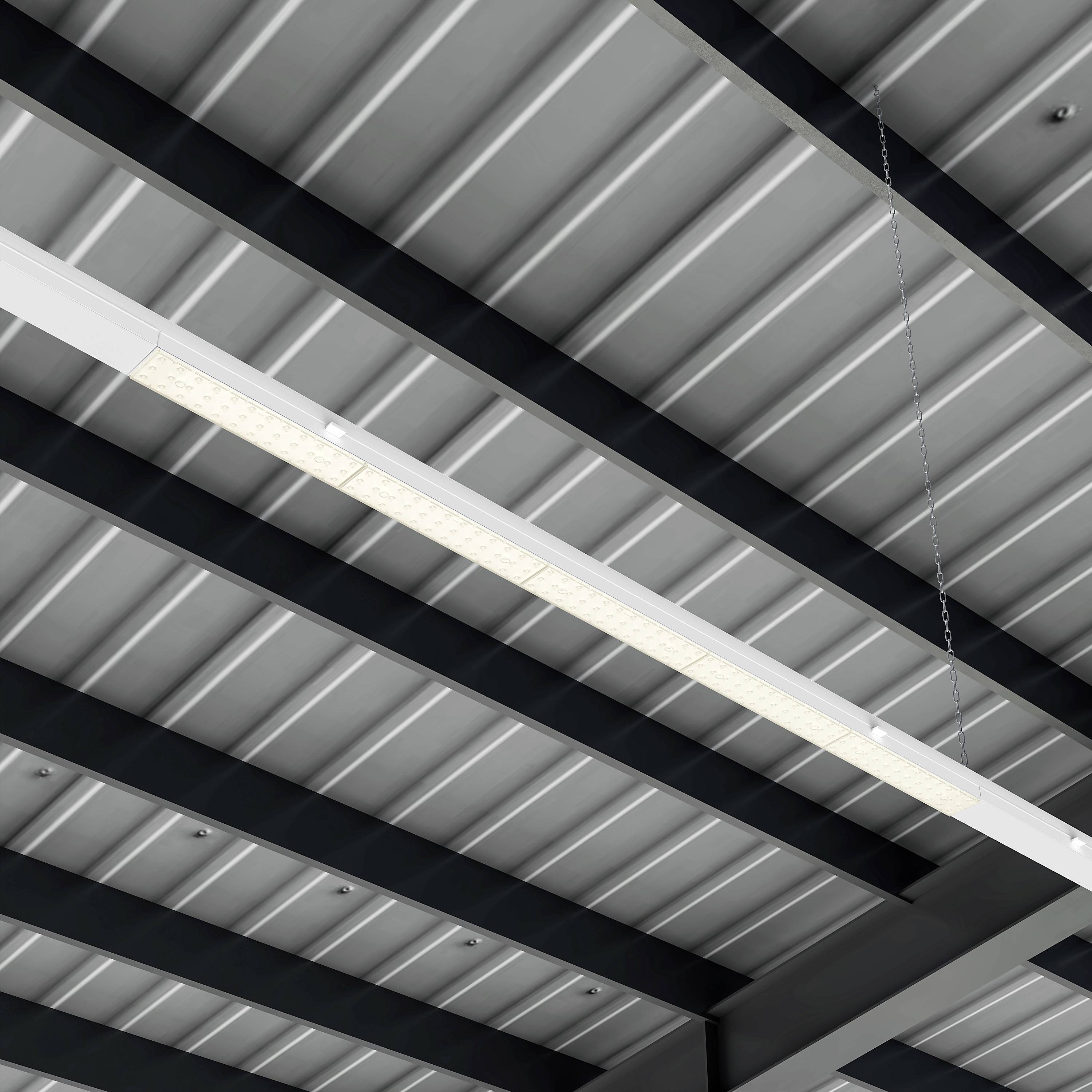 A kép egy helyiség mennyezetét mutatja egy hosszú, modern LED-fénycsíkkal, amely fémtartókra van rögzítve.