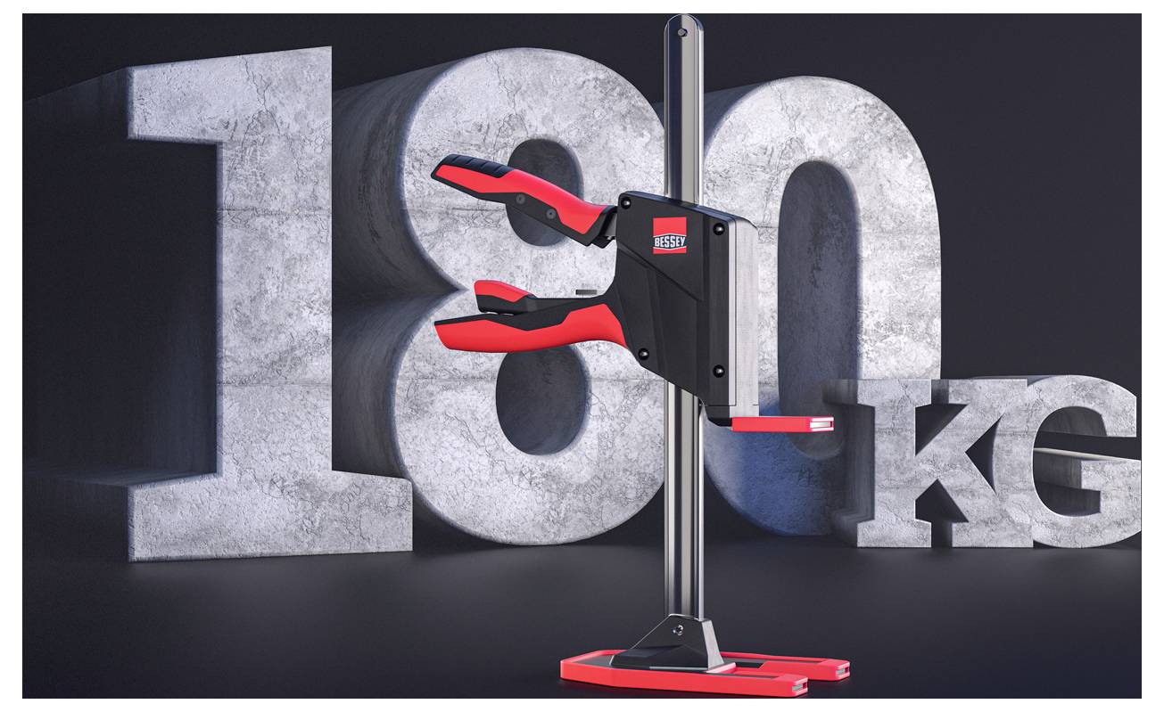 'Egy 180 kg teherbírású lift berendezés, amely vastag, betonszerű számjegyekkel van feltüntetve sötét háttér előtt.'