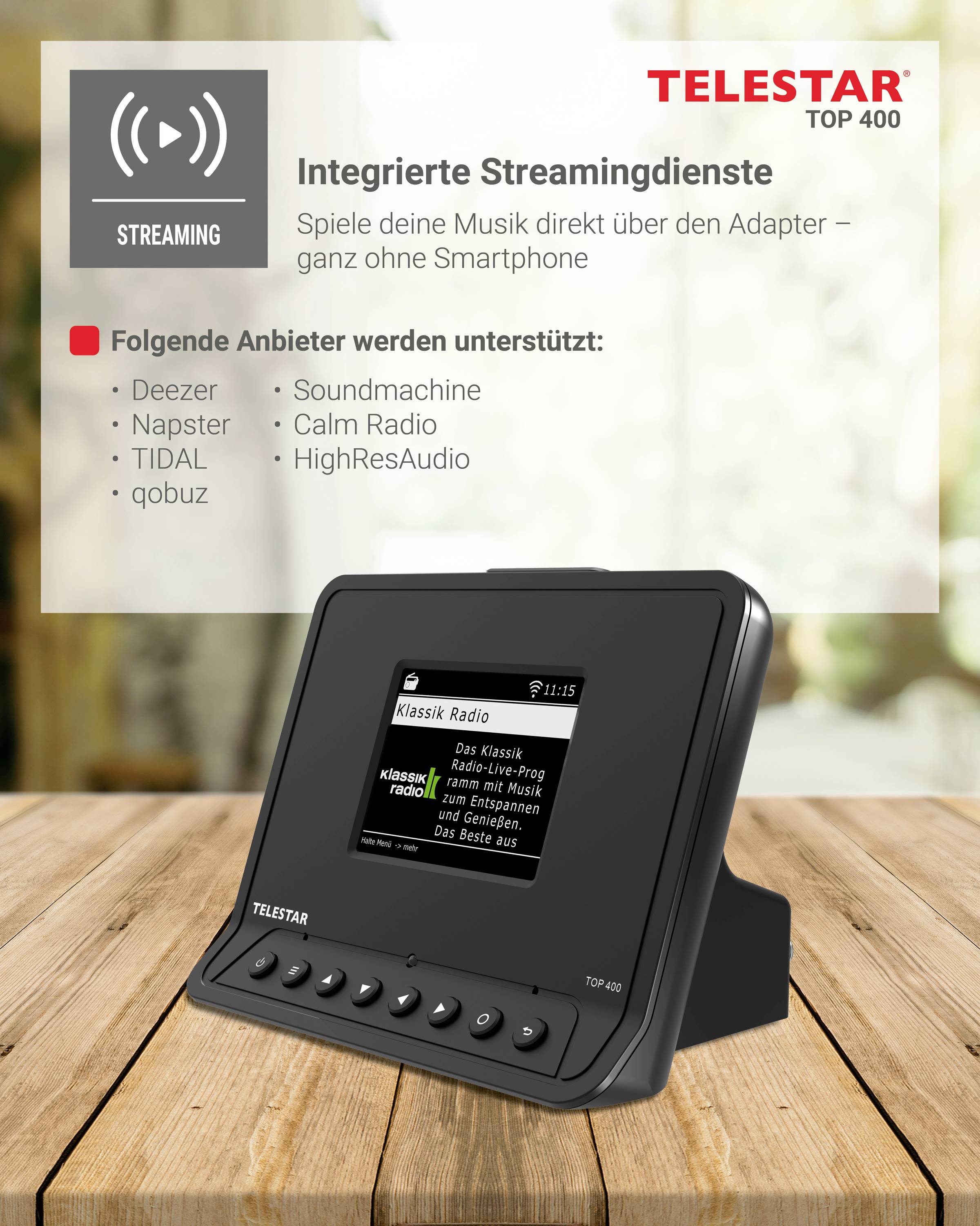 Egy fekete streaming eszköz egy fa asztalon. A kijelzőn 'Klassik Radio' látható. Támogatott szolgáltatások: Deezer, Napster, TIDAL, qobuz, Soundmachine, Calm Radio, HighResAudio.