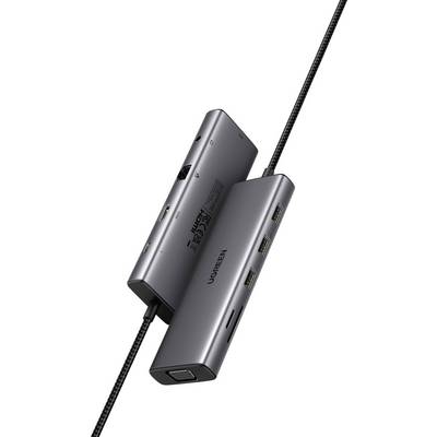 Egy kétoldalú USB-C elosztó, amely több portot tartalmaz, többek között HDMI, VGA, USB és Ethernet csatlakozókat, ferdeszögből fényképezve. Az eszköz célja a különböző eszközök csatlakoztatásának megkönnyítése.