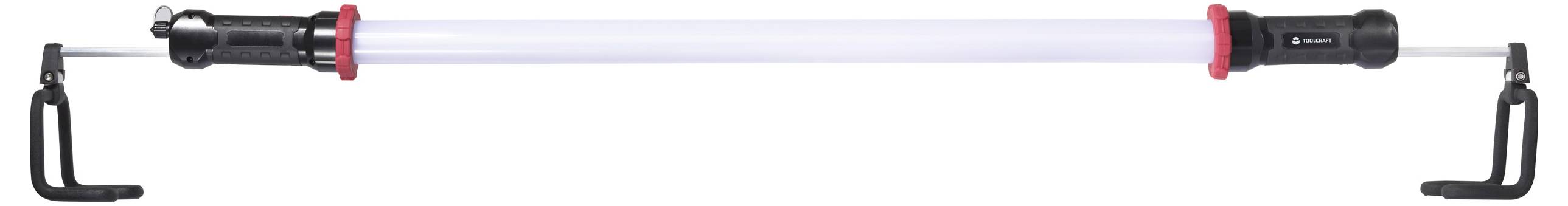 Egy teleszkópos rúd fekete fogantyúkkal és vörös kiemelésekkel vízszintesen nyúlik, ami a különféle alkalmazásokhoz állítható hosszúságra utal.