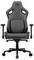 Egy fekete, ergonomikus gamer szék, steppelt párnázattal, állítható kartámasszal és magas háttámlával. Hosszan tartó számítógépes munkára alkalmas.