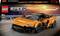 LEGO Speed Champions McLaren Solus GT készlet csomagolása, amelyen egy naplementés úton egy narancssárga McLaren autó látható fekete részletekkel. 9 éves kor felett ajánlott.