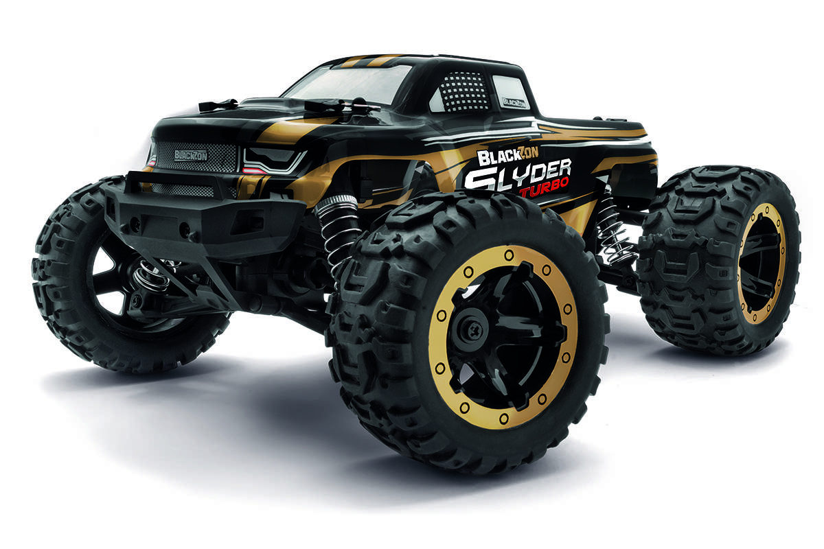 Egy fekete és sárga monster truck játék nagy kerekekkel és felfüggesztéssel, amelynek az oldalán a 'Blackzon Slyder Turbo' felirat látható.