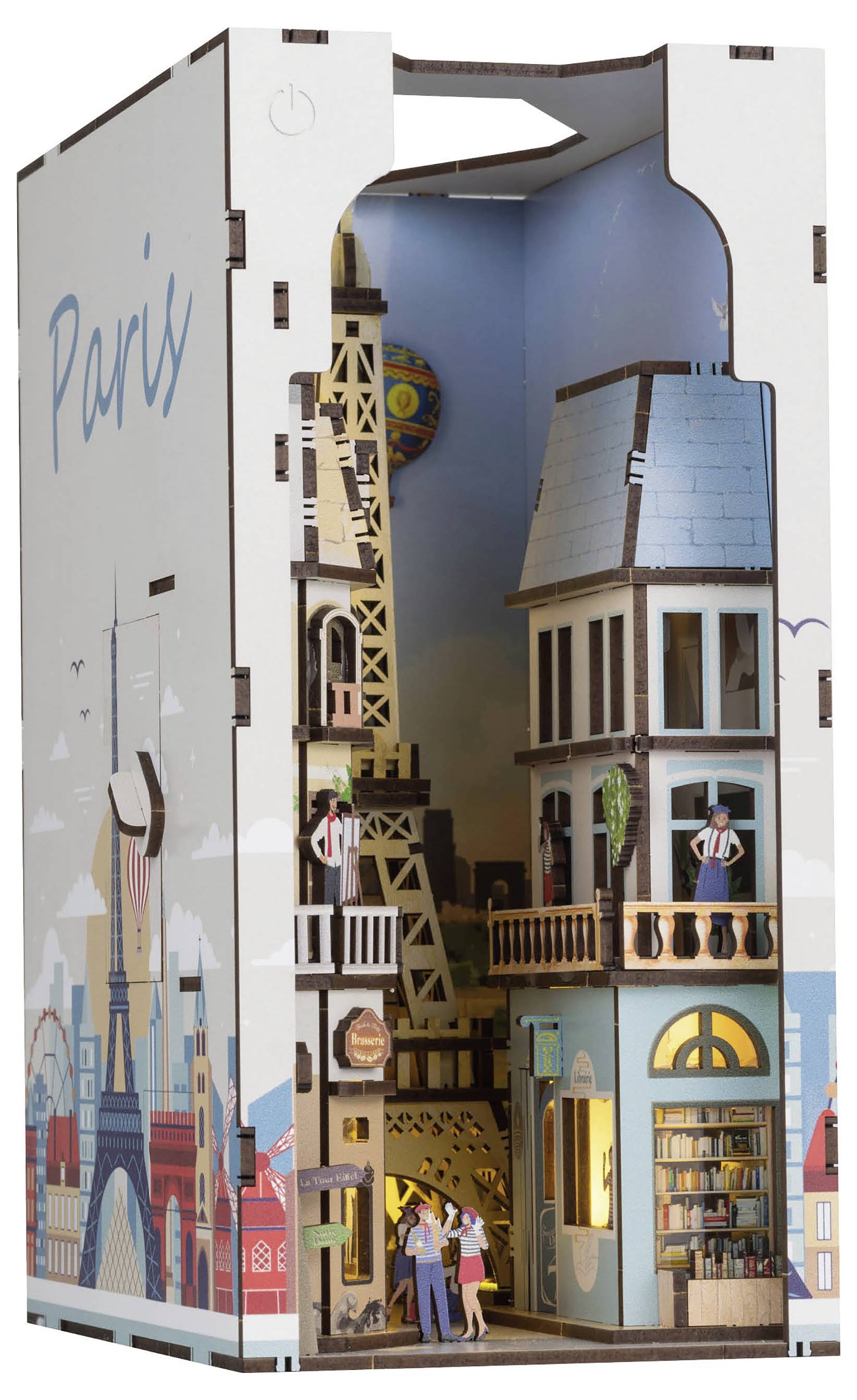 Párizst megidéző dekoratív doboz miniatűr Eiffel-toronnyal, párizsi épülettel és belső jelenetekkel, amely egy hangulatos párizsi utca hangulatát kelti.