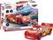 Piros versenyautó játékmodell '95' számmal és 'Lightning McQueen' névvel a dobozon, összeszerelési útmutatóval.