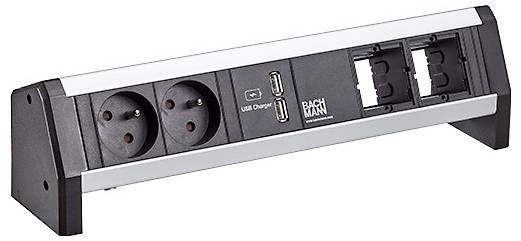 Egy asztali elosztó két európai elektromos aljzattal, két USB töltőporttal és két üres moduláris csatlakozóhellyel, irodai használatra tervezve.