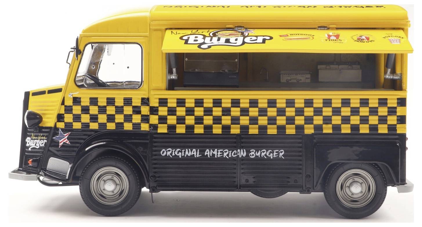 Egy sárga és fekete ételbusz, amelynek oldalán 'Eredeti Amerikai Hamburger' felirat szerepel, kockás mintával és látható kiszolgáló ablakkal.