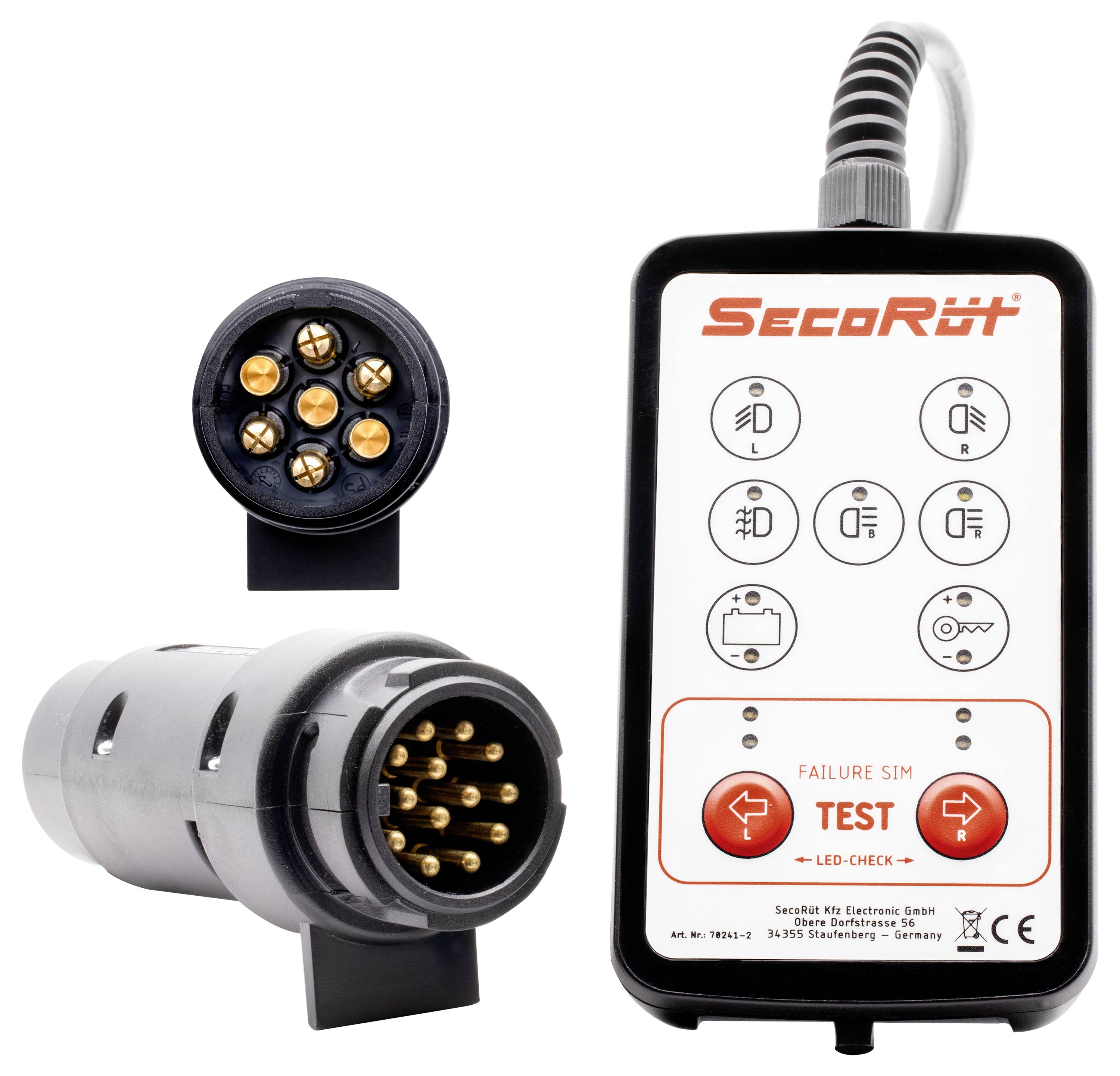 Teszteszköz csatlakozókkal vonóhöz. A "SecoRüt" feliratú eszköz LED-jelzőkkel és egy diagnosztikai csatlakoztathatóság teszteléséhez szükséges tesztgombbal rendelkezik.