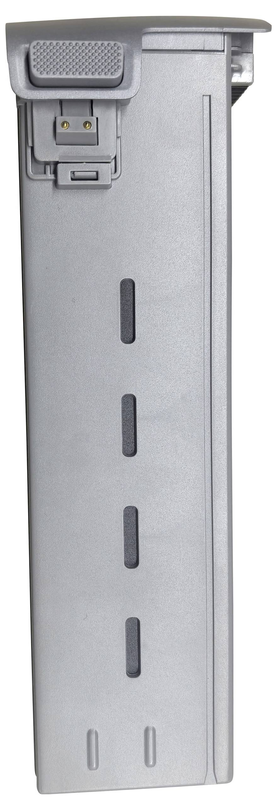 Egy ezüstös fémből készült tár, textúrált retesszel és hosszán végigfutó jelölésekkel, amelyet lőszer tárolására használnak egy tűzfegyverben.