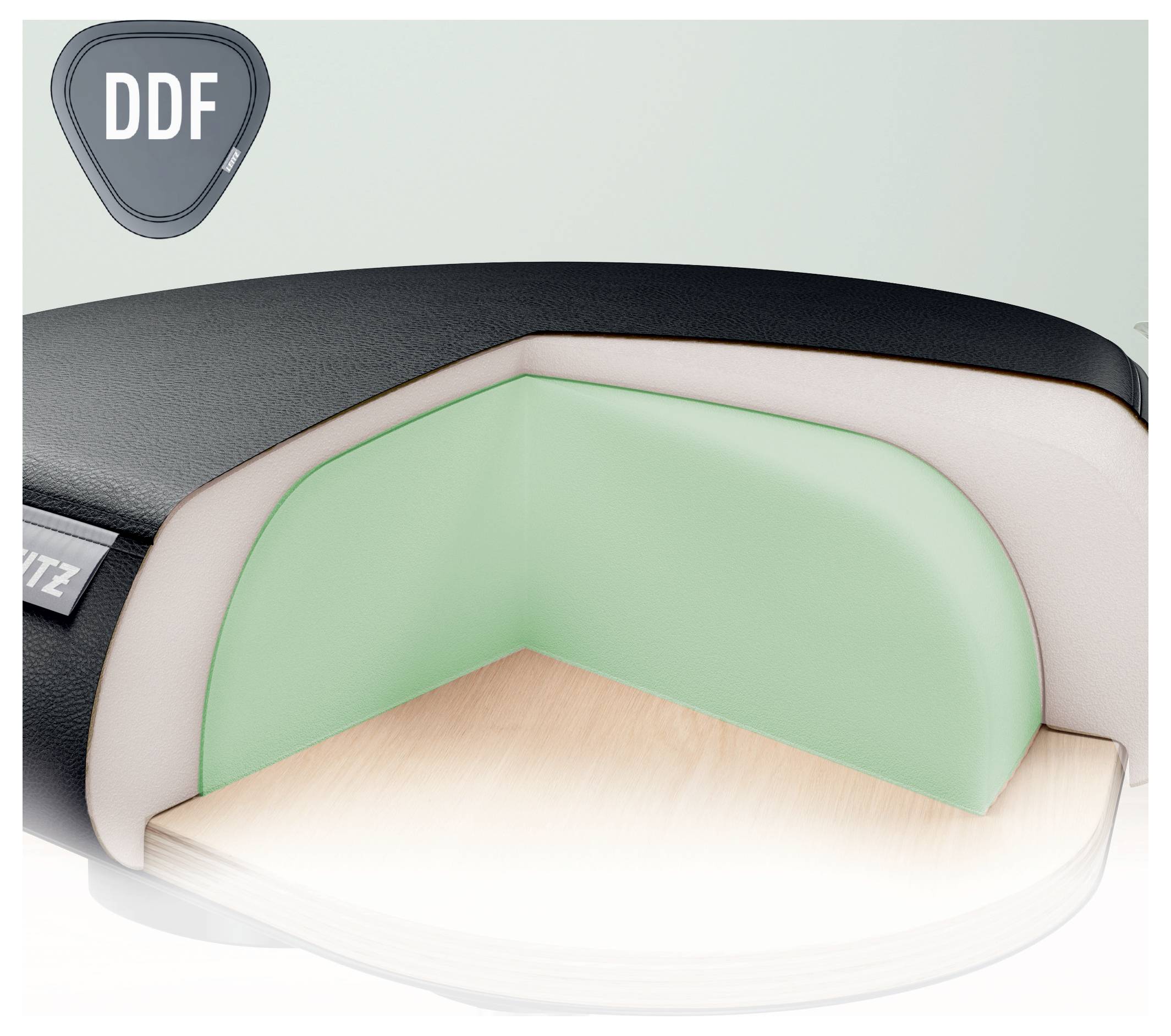 Egy szék illusztrációja, amelynek zöld párnázott sarka van, bemutatva rétegezett szerkezetét. A felső réteg sötét, puha belsővel.