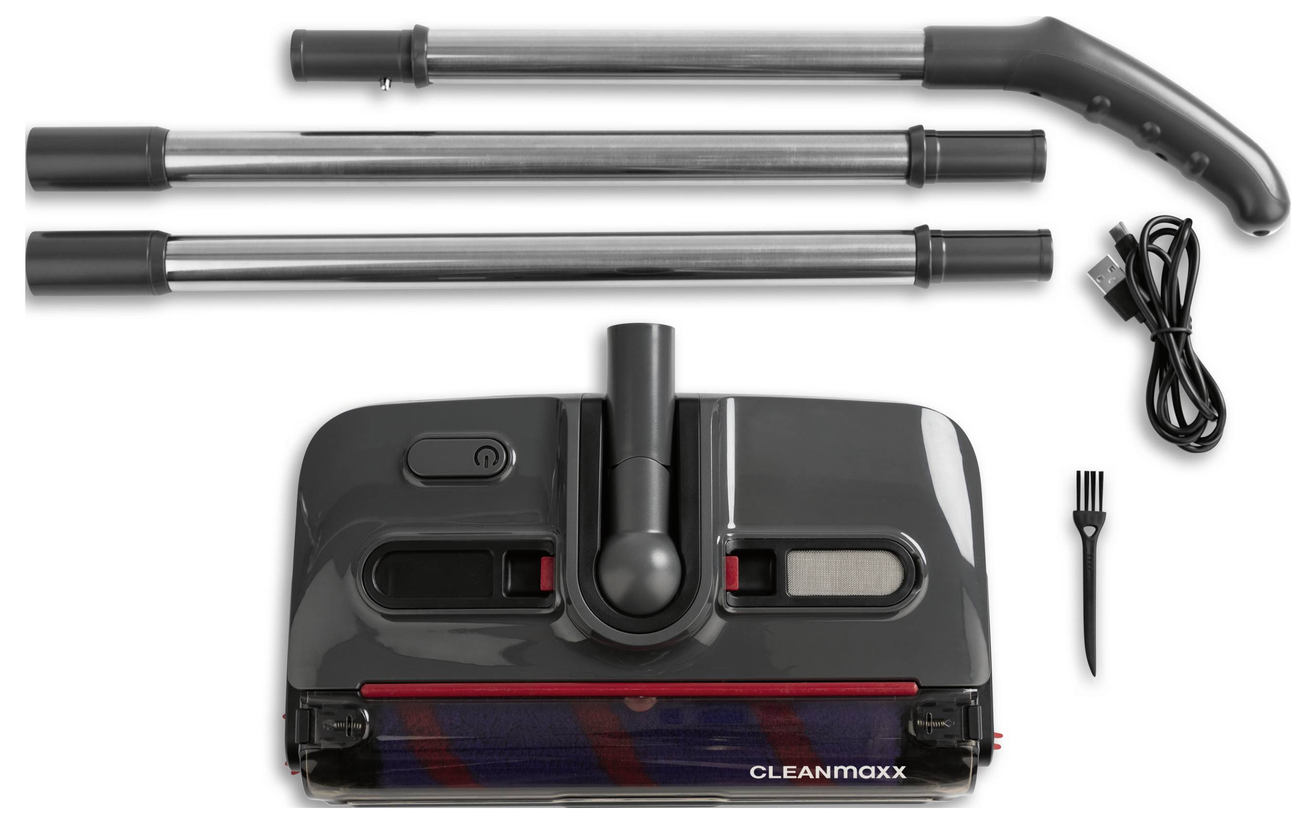 Porszívó alkatrészei elrendezve: fogantyú, hosszabbítótömlők, főtisztító fej "Cleanmaxx" felirattal, tápkábel és kis kefeszörnyeg.