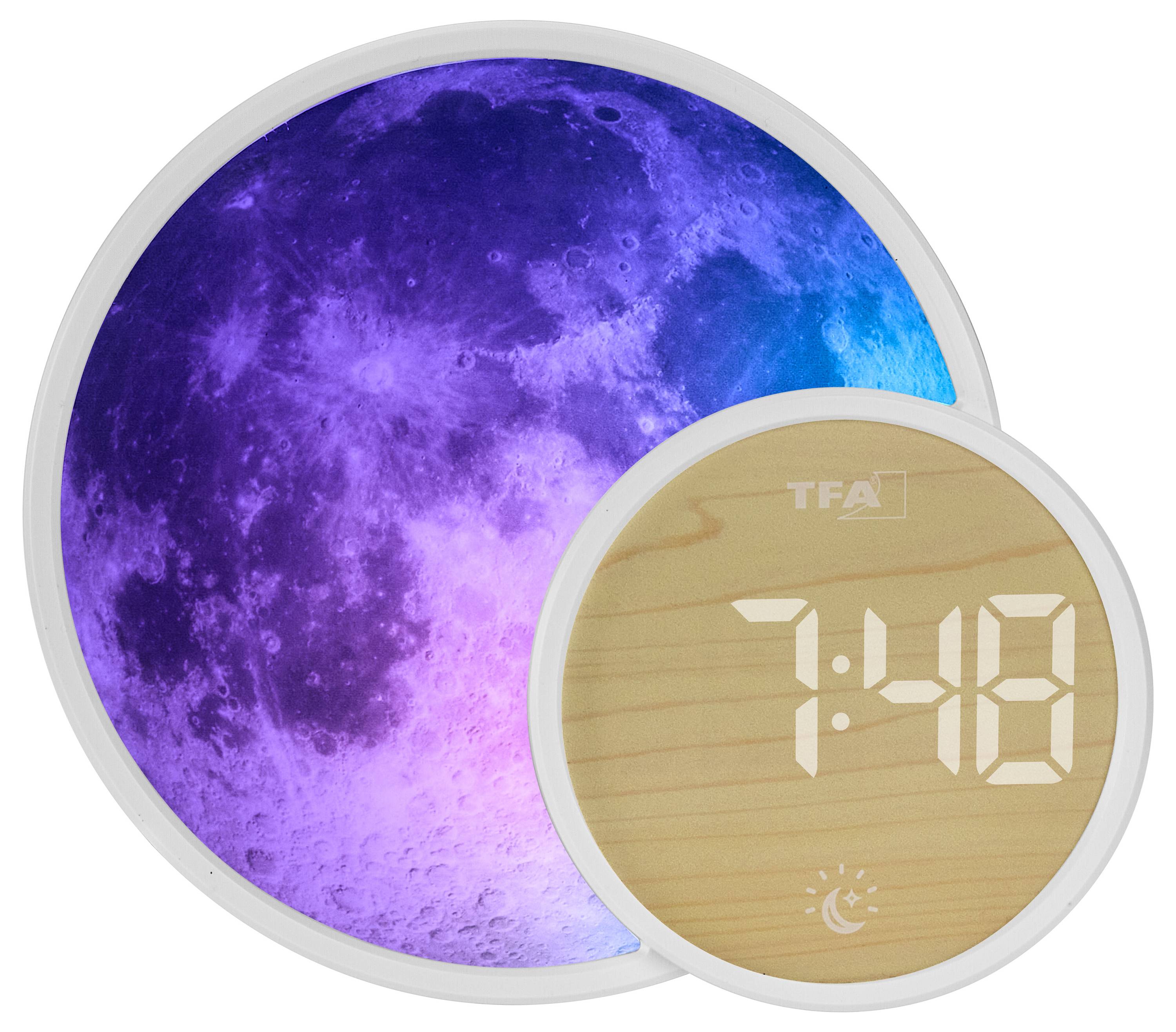 Egy digitális óra, amely "7:48"-at jelenít meg, hold-témaúa háttérrel, lila és kék árnyalatokkal, a TFA logóval kiegészítve.