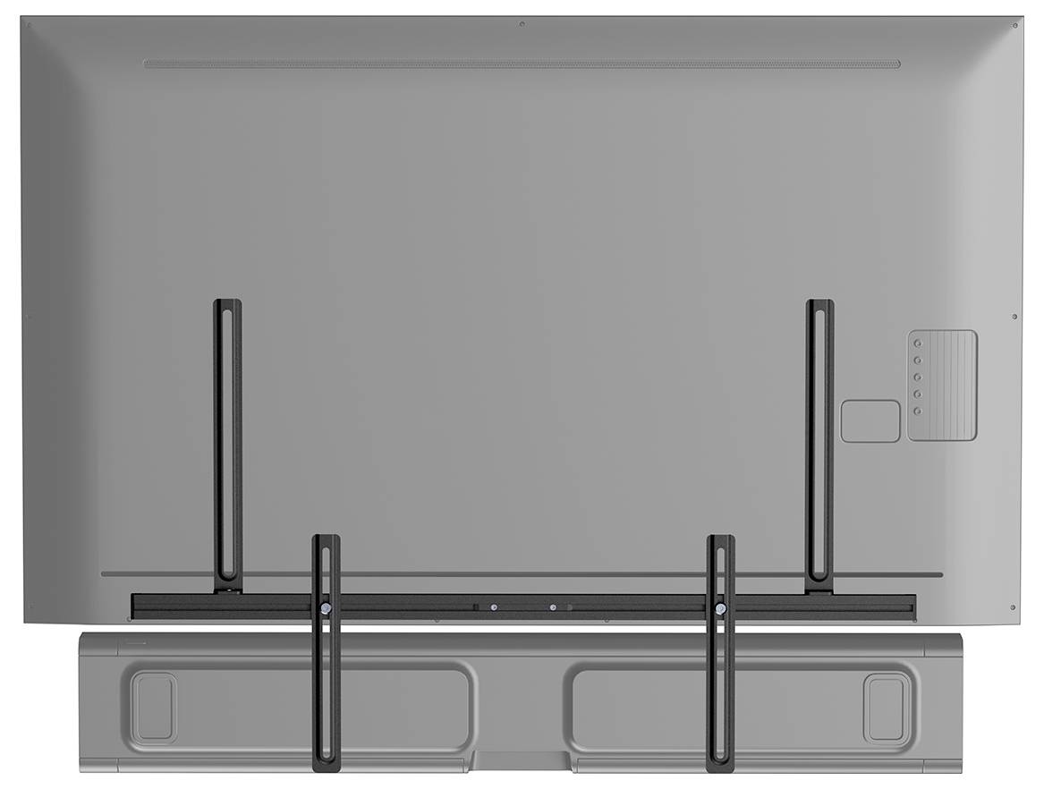 Egy lapos képernyőjű TV hátoldala, alatta rögzített soundbar-ral, amely a TV-n lévő rögzítési konzolokat és csatlakozási portokat mutatja.