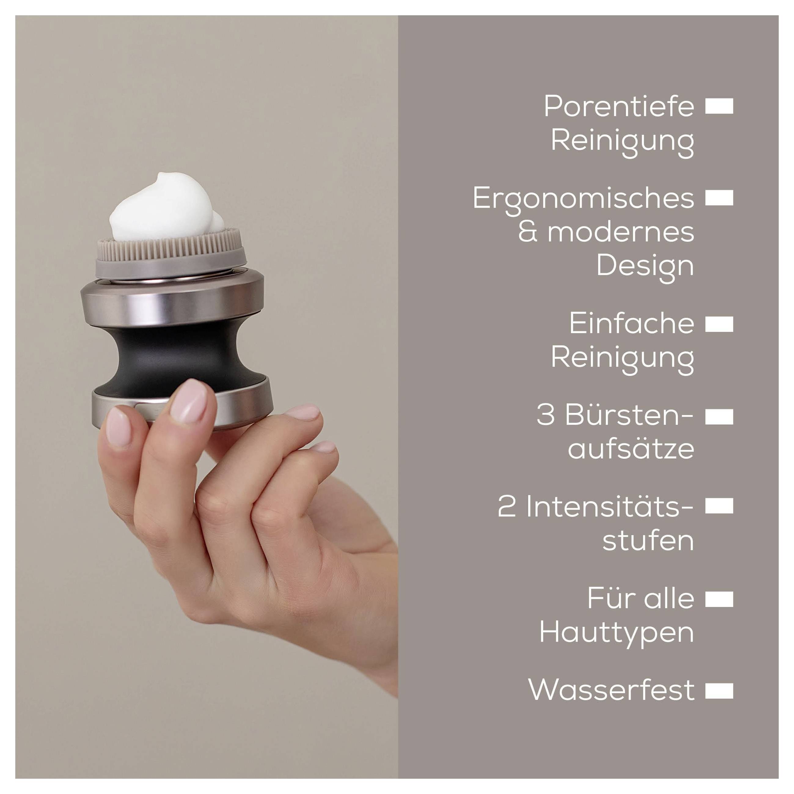 Egy Dell számítógép monitor hátoldala, amely elegáns, ezüst kialakítást mutat vékony állvánnyal. A monitor minimalistikus megjelenésű.