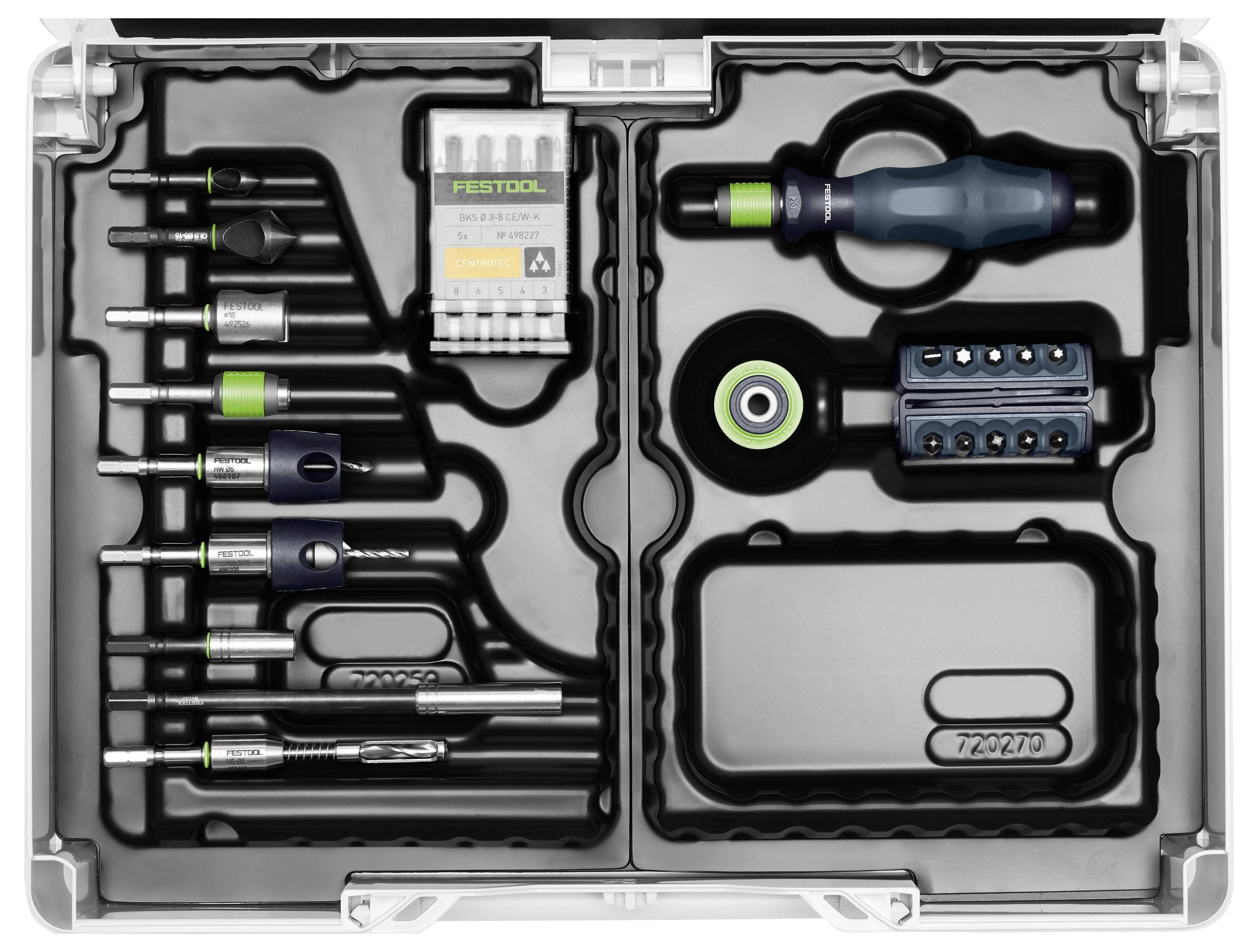 Szerszámkészlet különféle fúrófejekkel, csavarhúzó nyéllel és patronnal formázott tálcákon. Az eszközök ordentlich szervezett, külön rekeszekben helyezkednek el.