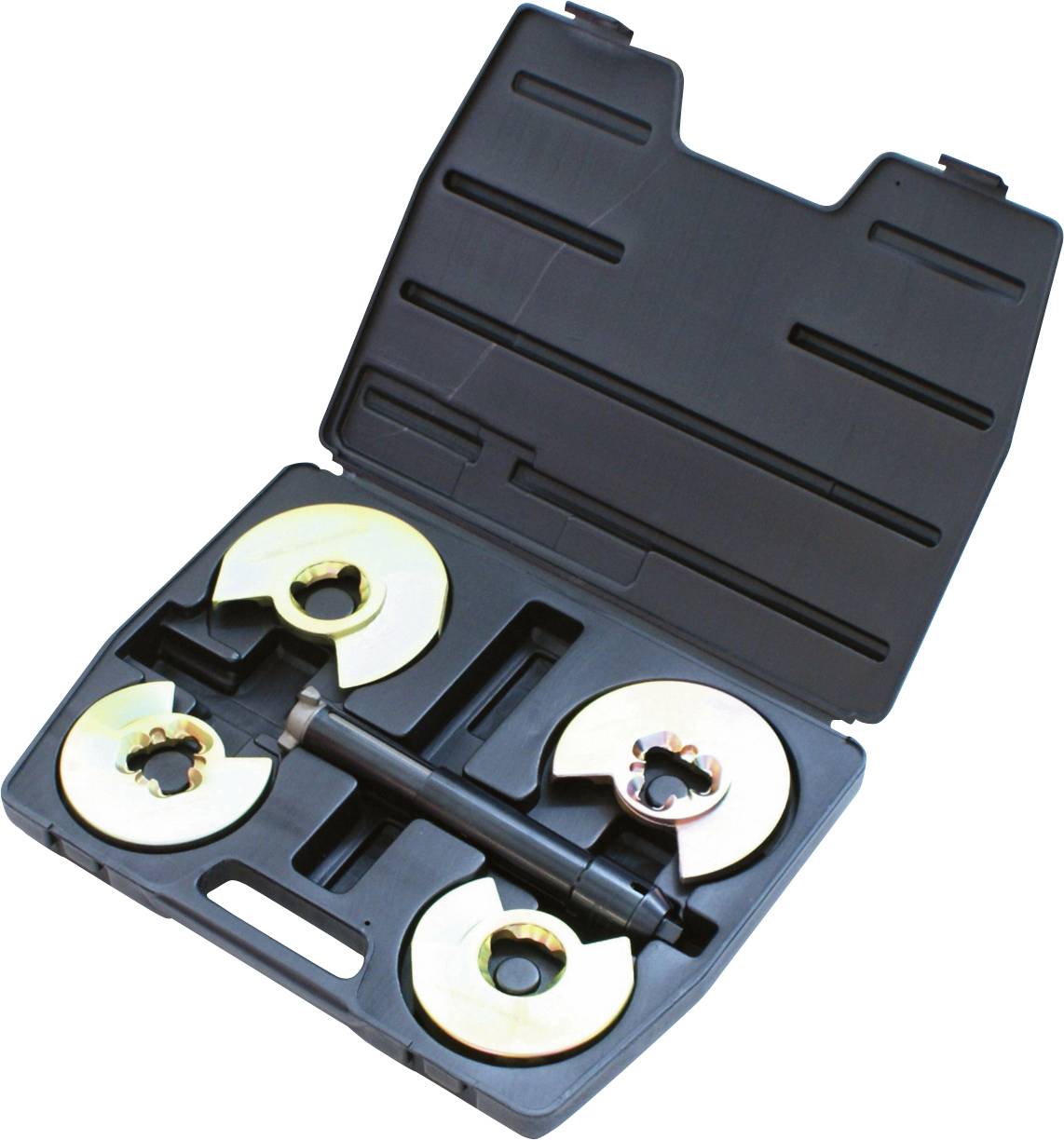 Nyitott fekete doboz, amely négy kerek fémes szerszámot és egy központi rudat tartalmaz, mechanikai célokra, például igazításhoz vagy emeléséhez használatos.