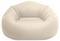 Egy nagy, bézs színű babzsákfotel puha, lekerekített kialakítással és széles, invitáló ülőfelülettel.