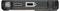 Egy fekete kézi eszköz közeli képe, amely egy USB portot, egy fejhallgató csatlakozót és egy bekapcsológombot mutat az oldalán.