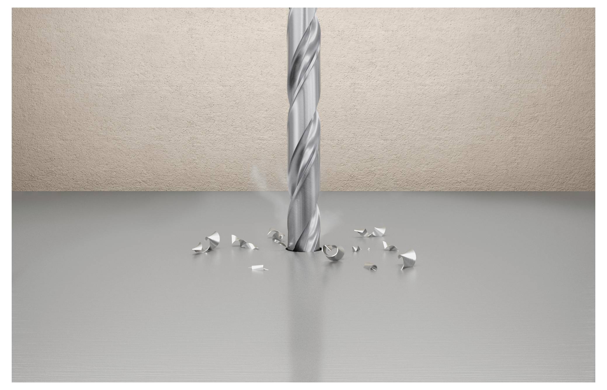 Egy fúrófej, amely egy felületbe fúr, fém forgácsokkal szétszórva körül, ami az éppen folyó fémmegmunkálást jelzi.