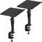 Két fekete állítható asztalcsipesz lapos platformokkal, monitorok vagy hangszórók támogatására tervezve, csavarcsíptetési mechanizmusokkal a stabilitás érdekében.