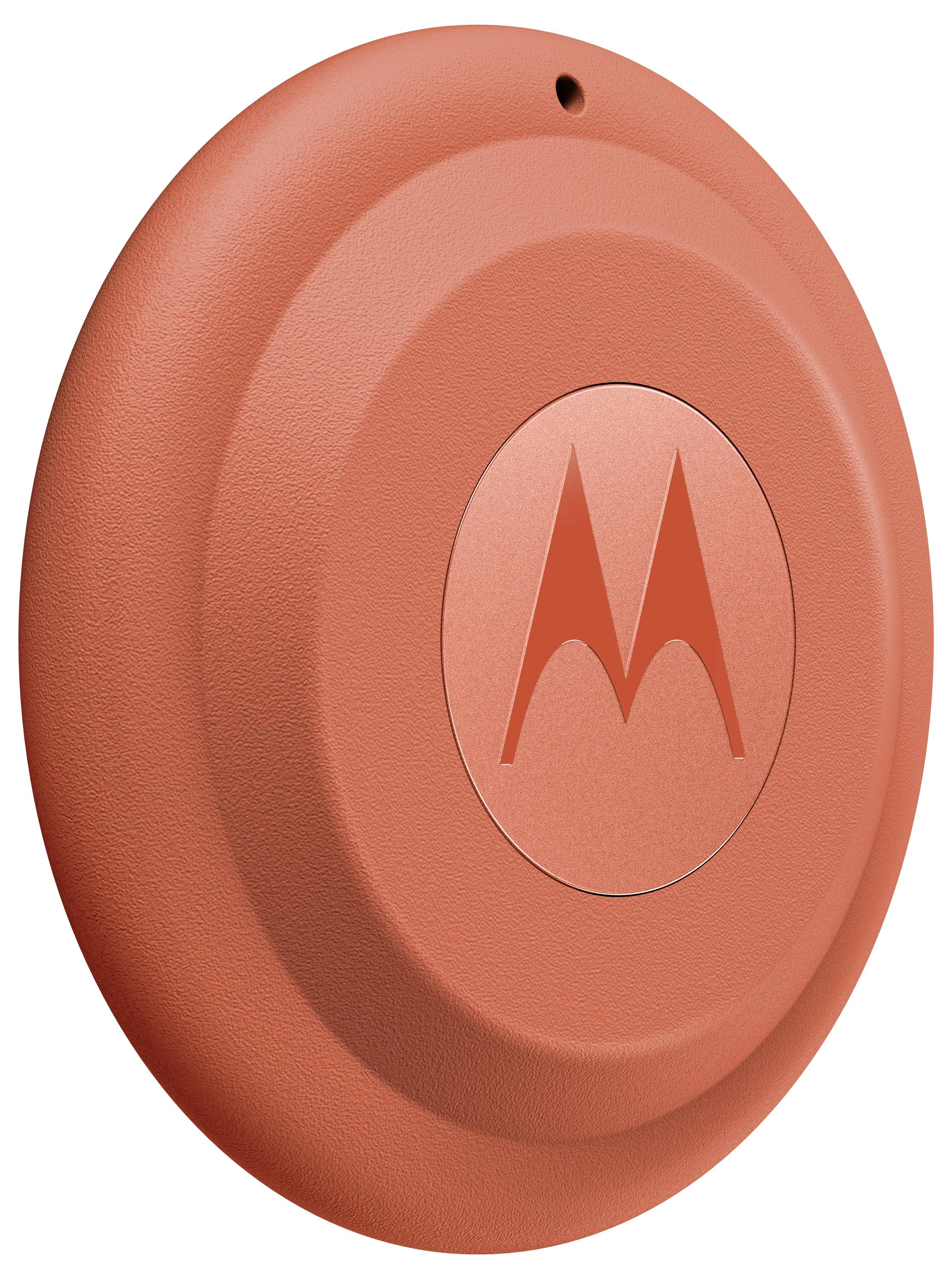 Egy kerek, piros Motorola eszköz központi logóval, valószínűleg egy műszaki gadget vagy kiegészítő.