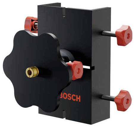 Fekete Bosch mechanikai bilincs vagy rögzítő eszköz piros állítócsavokkal és sárgaréz középső csatlakozóval fehér háttéren.