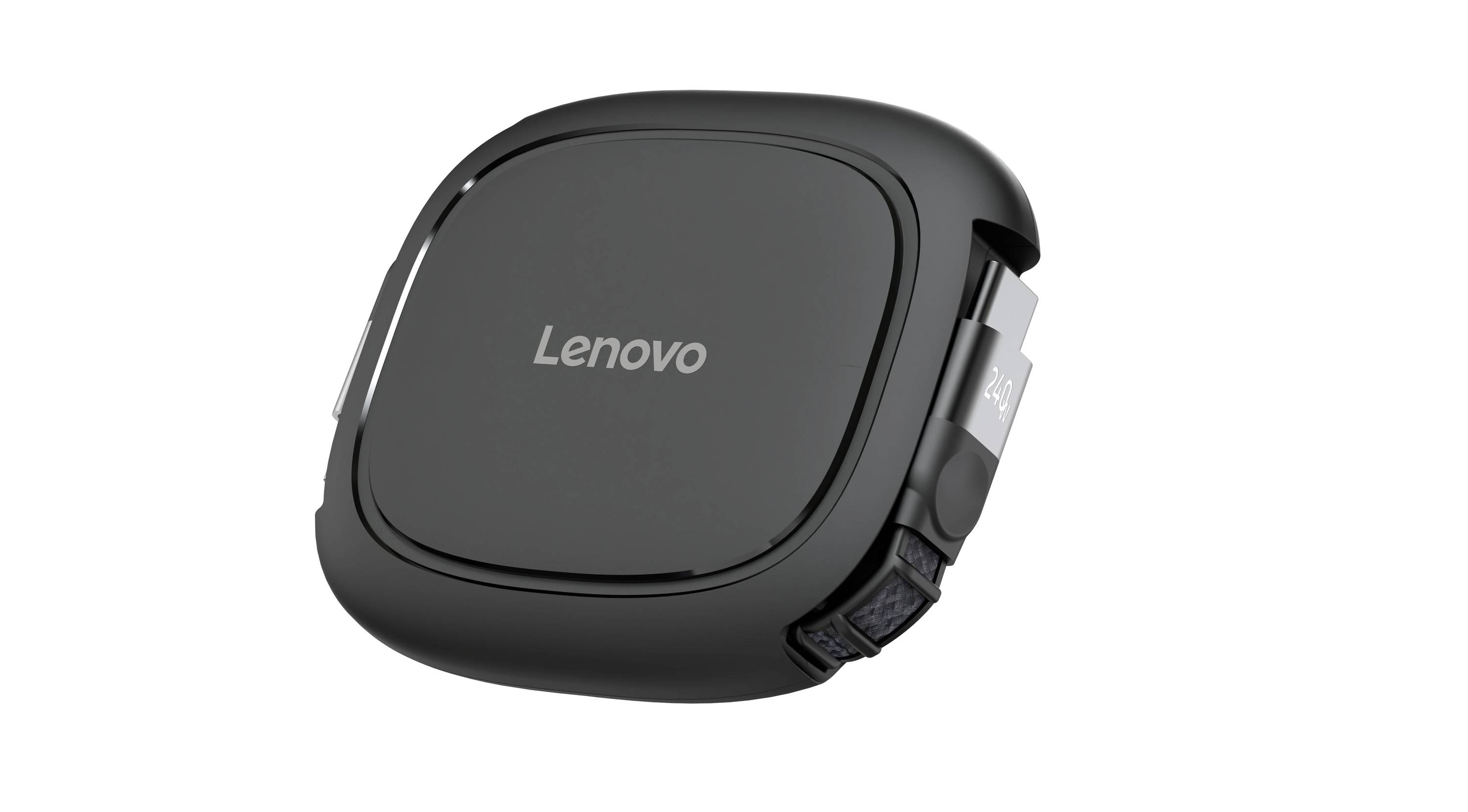 Fekete Lenovo hordozható elektronikus eszköz közelképen, a Lenovo logóval középen az előlapon.