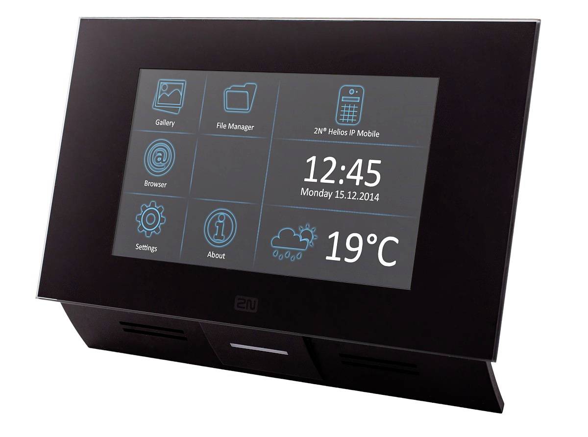 Érintőképernyős kaputelefon kijelző, amely alkalmazásikonokat, az időt 12:45, a dátumot hétfő 15.12.2014, és az időjárást 19°C mutatja.