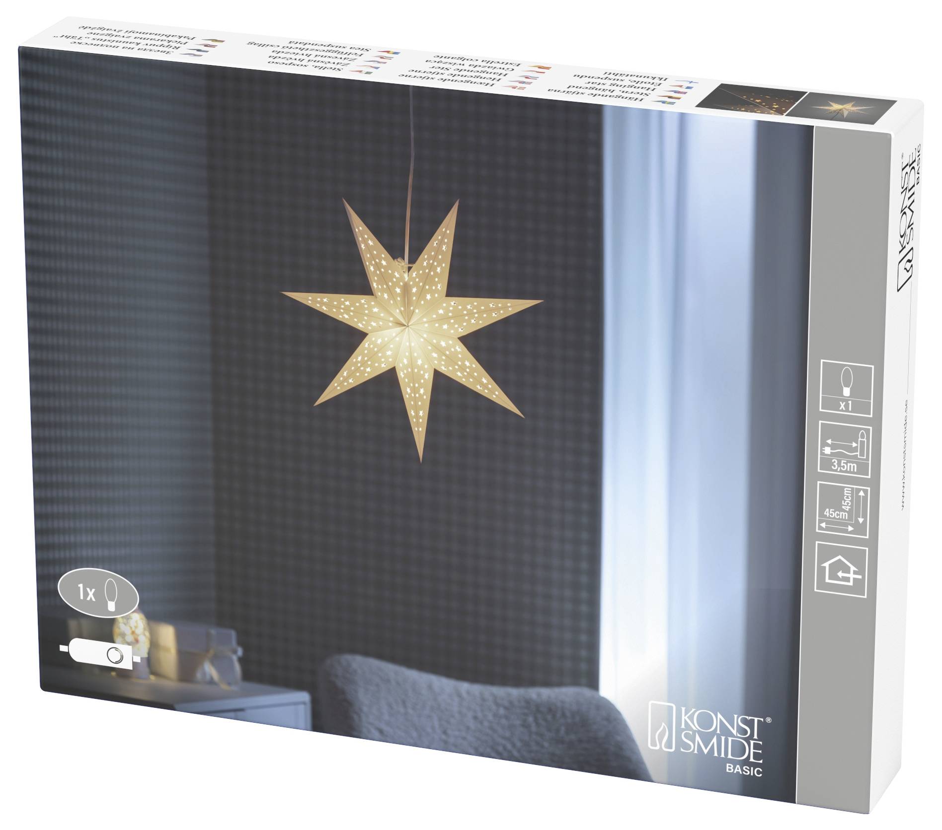 Konstsmide Basic LED csillag lámpa termékdoboza, meleg fénnyel világító függő csillag egy szobai jelenetben, az oldalon használati ikonokkal.