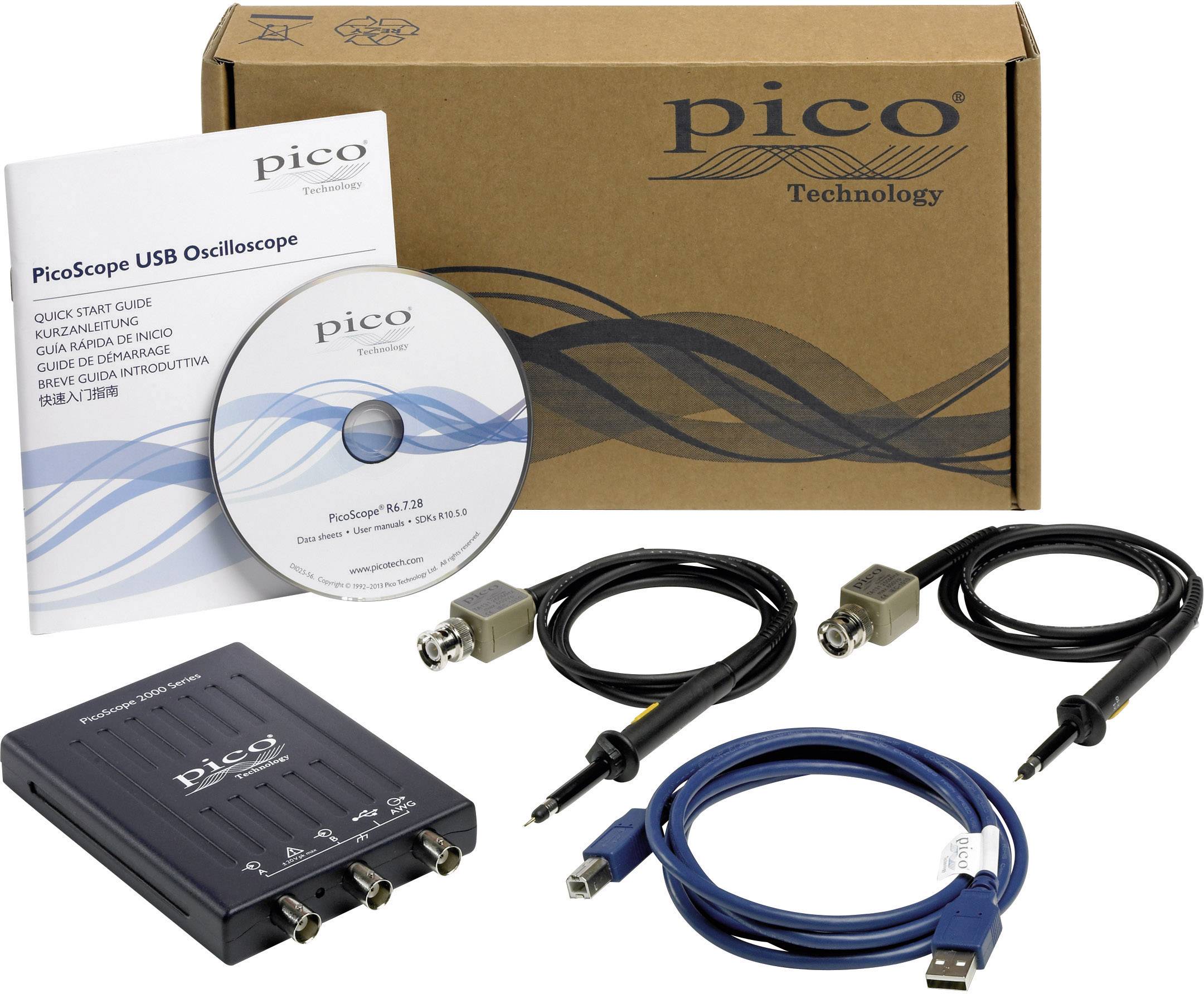 PicoScope USB-oszcilloszkóp-készlet oszcilloszkóppal, kábelekkel, kézikönyvvel és telepítő CD-vel. Háttérben a Pico Technology csomagolása.